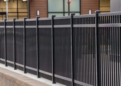 Commercial architectural iron fencing installation by Advanced Fences — ornamental steel perimeter fencing for business properties in Texas